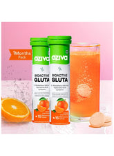 OZiva Bioactive Gluta Glutathione Tablets for Skin Glow in orange flavor with a glass of drink